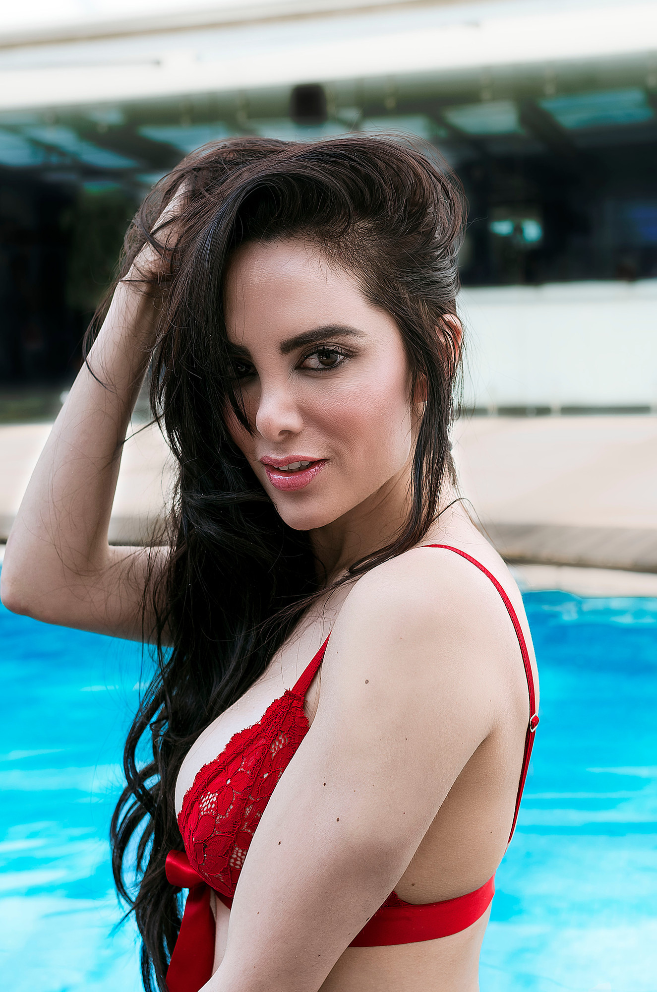 Poolside frame in natural light after retouching, skin texture and freckles kept, redness evened out